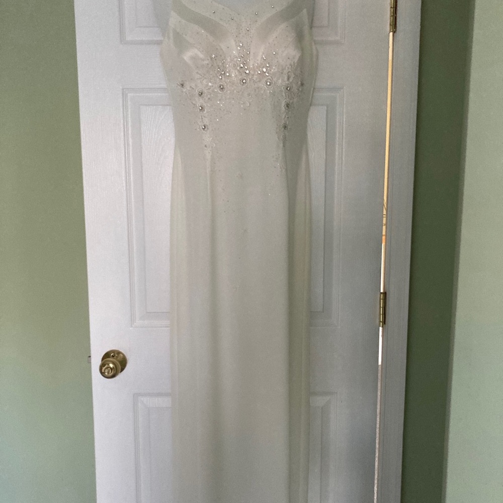 Elegant White Gown with Embellishments